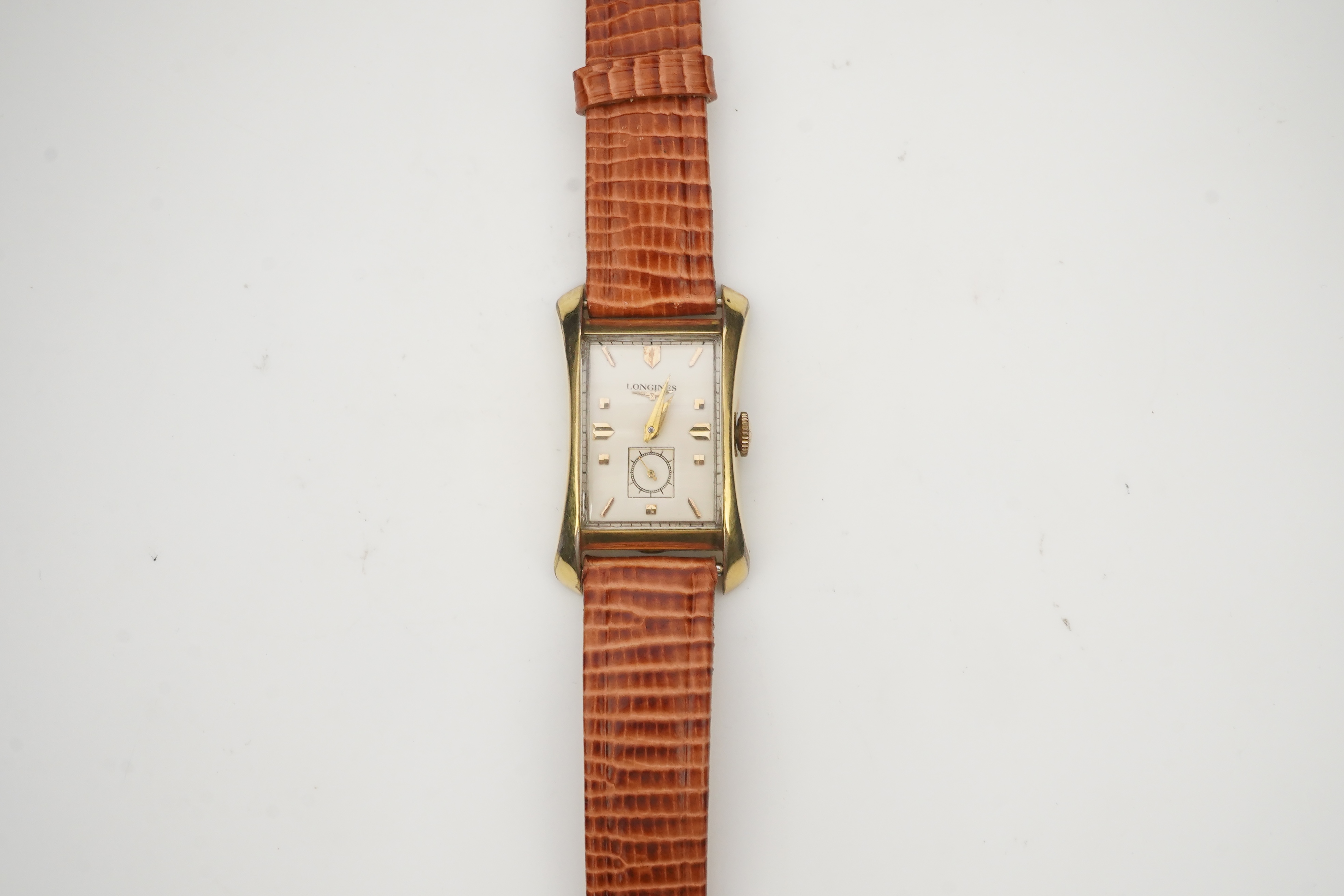 A gentleman's 1950's 10k gold filled Longines manual wind wrist watch, on a later associated leather strap